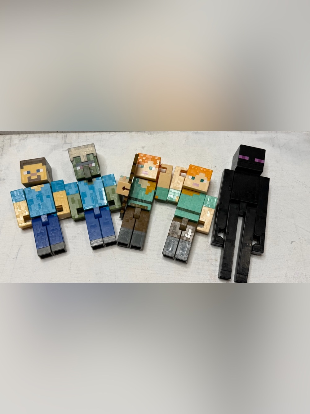 Collectible posable Largefigures of characters and mobs from the game Minecraft.